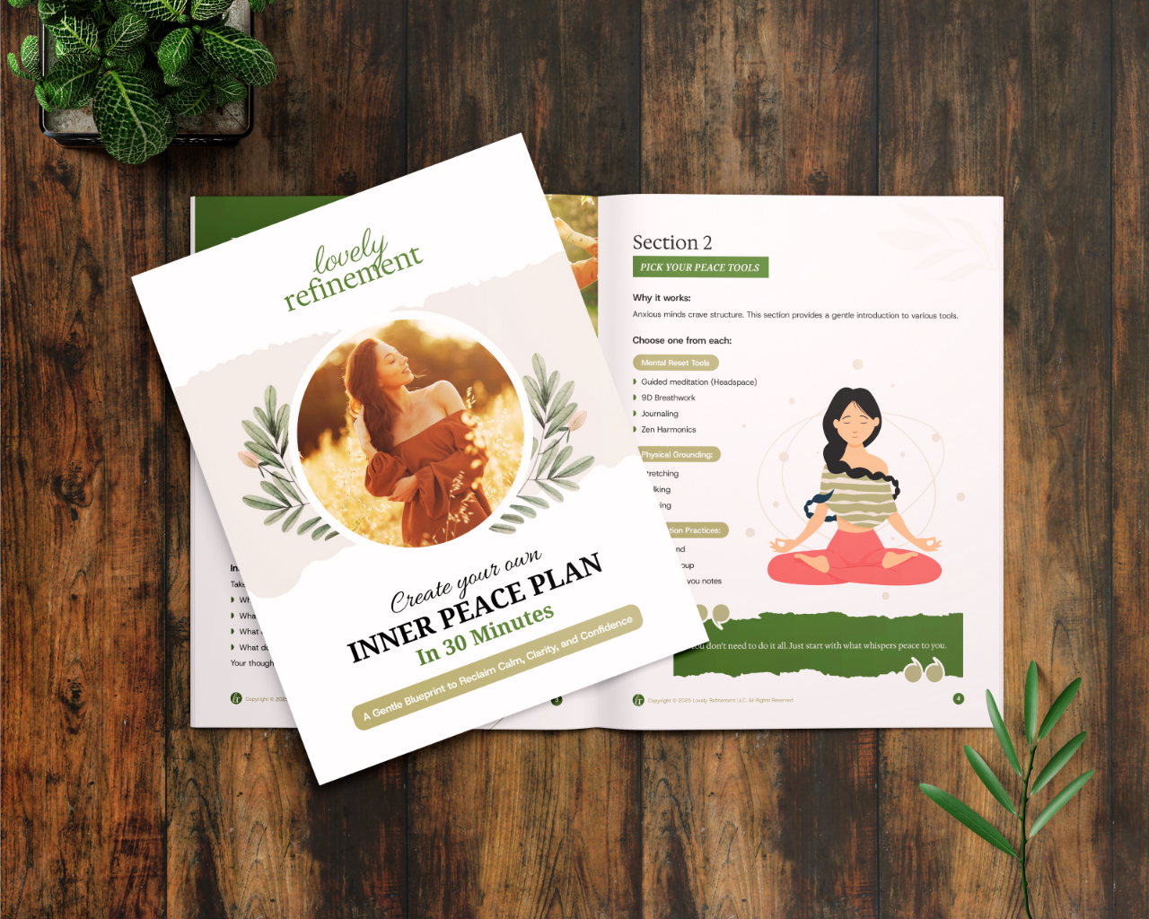 Two pages from a beautifully designed mental health guide titled "Create Your Own Inner Peace Plan in 30 Minutes" by Lovely Refinement are shown on a wooden table with greenery. The cover features a serene woman in a field at golden hour surrounded by botanical illustrations. The open page highlights Section 2 with illustrated peace tools, including meditation and journaling, alongside an image of a woman meditating.